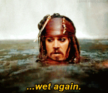 a picture of a man in the water with the words wet again