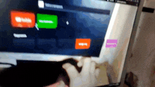 a person is using a mouse on a computer screen