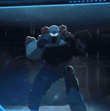 a robot is standing in a dark room with a blue light shining on it