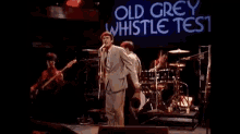 To Hell With Poverty GIF - The Old Grey Whistle Test Band Singing GIFs
