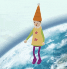 a cartoon character wearing an orange hat and a yellow top with two stars on it