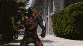 a man in a monster costume with the word build on his chest