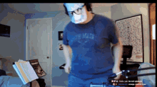 a man wearing a mask and a shirt that says ' south main ' on it