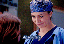 a woman wearing scrubs and a surgical cap says absolutely
