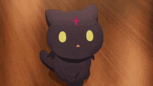 a black cat with yellow eyes and a red cross on its head