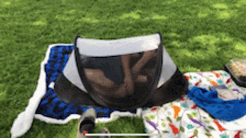gif of man rolling around in tiny tent