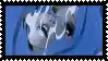 a close up of a person 's face with milk coming out of it on a blue background .