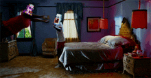 a man in a red shirt is flying through the air while holding a game controller in a bedroom