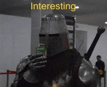 a knight in armor drinking a bottle of juice with the words interesting above him