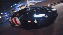 a car with the american flag painted on the side