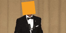 a man in a tuxedo has a yellow square on his face