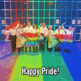 a group of people holding rainbow colored flags with the words happy pride above them