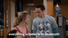 a man and a woman are standing next to each other with the words " everything is better with bluetooth " on the bottom