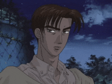 a close up of a man 's face with a blue sky behind him