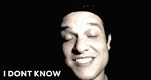 a man making a funny face with the words what the heck written below him