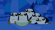 a group of penguins are sitting around a bowl of food with the word ribly on the bottom right