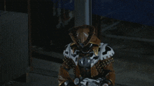 a person in a costume with a light coming out of their back