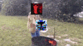 a man standing next to a trash can with a colorful image of a person on it