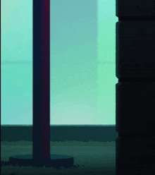 a red and blue pole in front of a green window