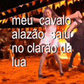 a woman in a pink dress is dancing with the words meu cavalo alazao saiju no clarao da lua