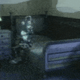 a bedroom with a bed , dresser , nightstand , and lamp .