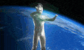a man in a white suit stands in front of a blue planet