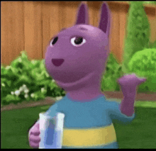 a cartoon character from backyardigans is holding a pitcher of water .