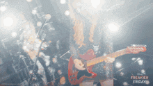 a poster for freakier friday shows a girl playing a guitar