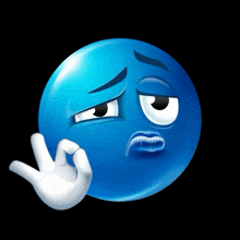a blue smiley face with ice on it 's face