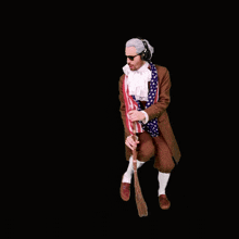 a man wearing headphones and an american flag costume is sweeping the floor with a broom