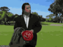 Kenny Catch John Travolta GIF - Kenny Catch John Travolta Frisbee GIFs