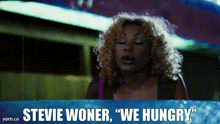 a picture of a woman with the words stevie woner we hungry on the bottom