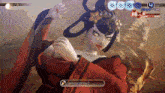 a woman in a red dress is dancing in a video game called dancing strike