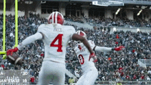 a football player with the number 4 on the back of his shirt
