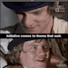 a man in a hat is smiling next to another man with a caption that says " initiative comes to them that wait "
