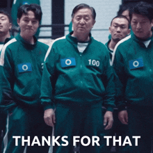 a group of men in green uniforms with the number 100 on them
