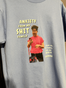 a t-shirt that says anxiety from my shit family on it