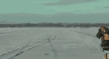 a man on a mobility scooter in the snow