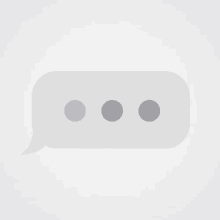 a white speech bubble with three dots on it