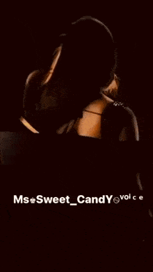 a woman in a black dress with the words ms sweet candy vol c on the bottom