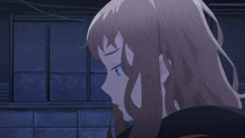 a girl with long brown hair and blue eyes is looking down