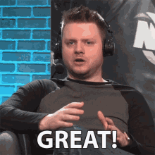 a man wearing headphones says great while sitting in a chair