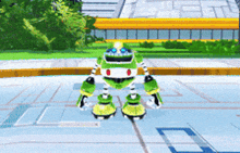 a green robot is standing on a white surface
