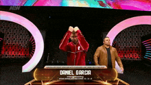 a wrestler named daniel garcia is on a stage