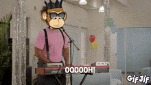 a gif of a monkey playing a keyboard with 00000h written on the keyboard