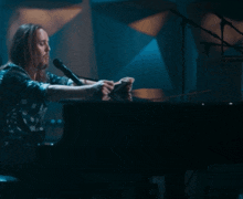 a man playing a piano with the words " what 's the point " below him