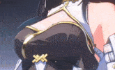 a close up of a woman 's breasts with a gold buckle