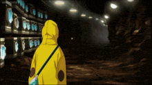 a person in a yellow hoodie is standing in a dark tunnel with a sign that says animepahe