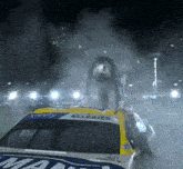 a race car with the word allgaier on the windshield