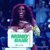 a woman holds a briefcase that says money bank on it